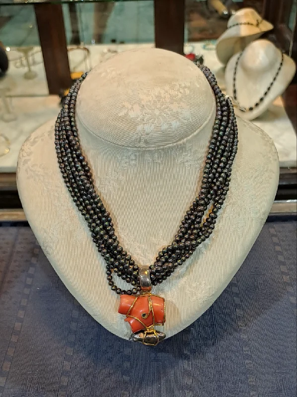 Ladies Necklaces Handmade Charm-Necklace in Black Tahitian Pearls with sterling silver elements and a Coral Pendant with brilliants and 18k elements