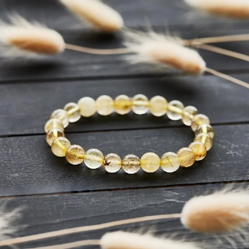 Ladies Bracelets with Globe Shine-The Golden Power Bracelet