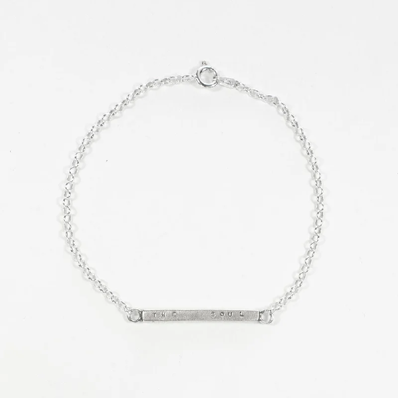 Ladies Bracelets with Cream Howlite-Medium Letter Pressed Bar Bracelet